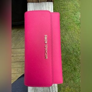 Dark pink Michael Kors full size wallet. Like new never used